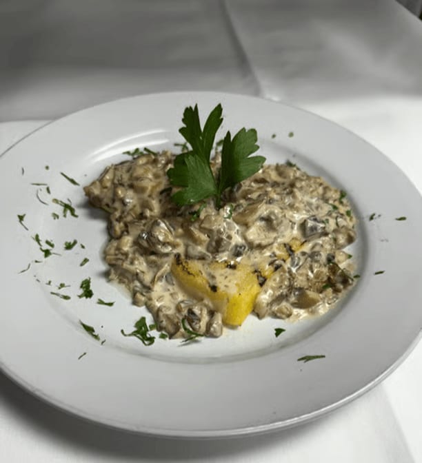Polenta Con Funghi Alla Profumo Di Tartufo.